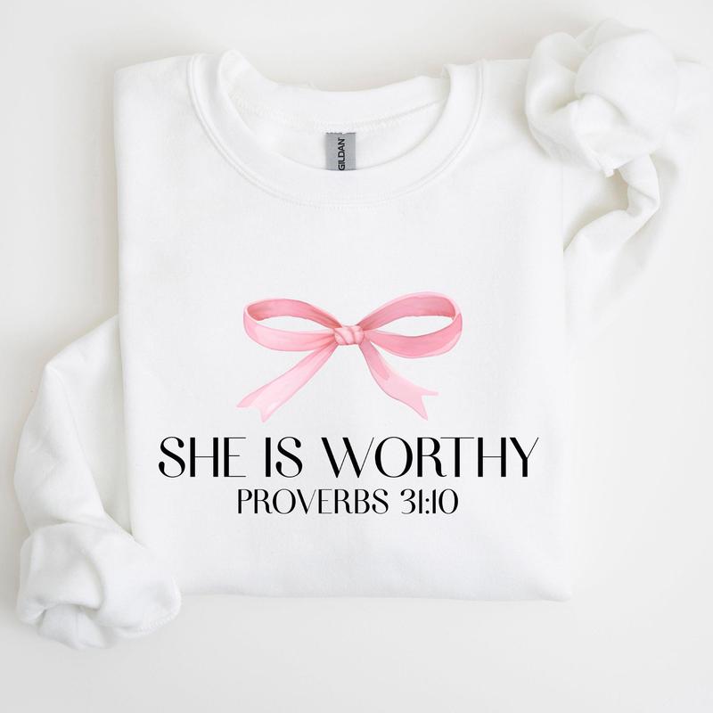 She Is Worthy, Bible Verse, Christmas, Bow, Pink, Proverbs, Soft Girl Era Sweatshirt, Women's Crew Neck, Crewneck