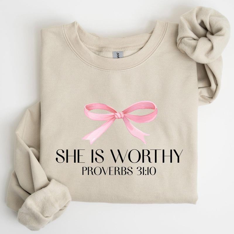 She Is Worthy, Bible Verse, Christmas, Bow, Pink, Proverbs, Soft Girl Era Sweatshirt, Women's Crew Neck, Crewneck