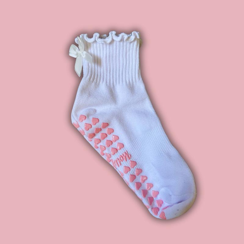 White ruffle grip sock with white bow and pink heart grips for pilates, yoga, lagree or barre